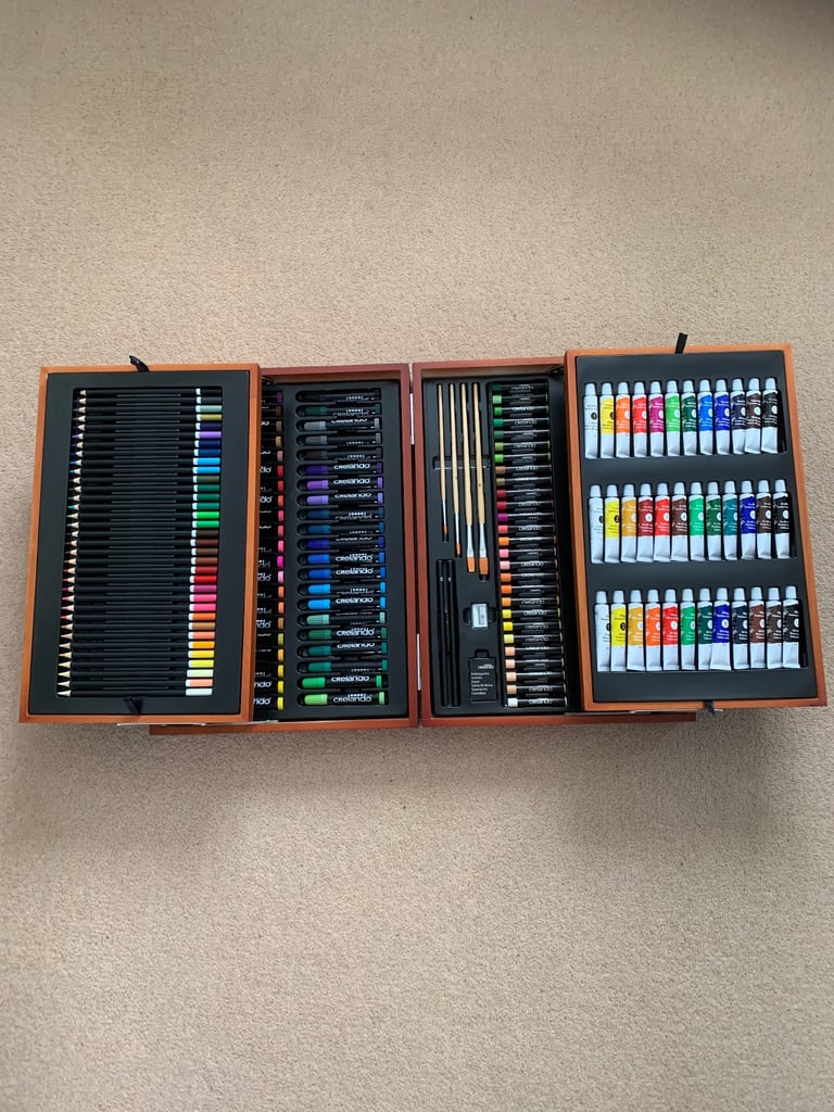 Art media case includes paint, pencils pens and pastels