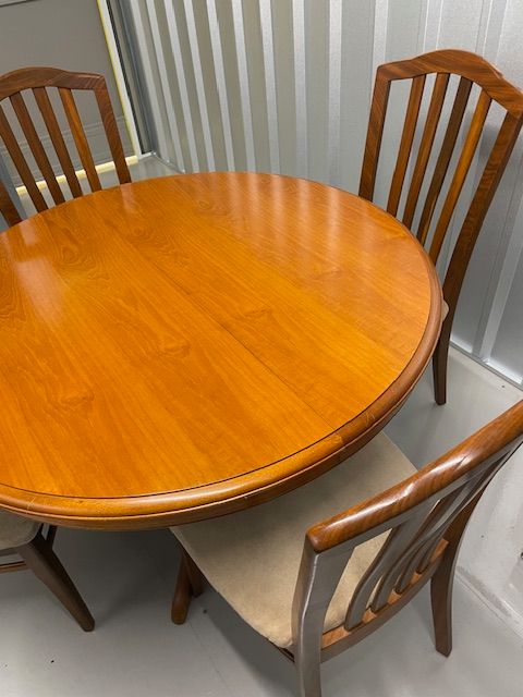image for Stag solid wood (teak) dining table with four chairs