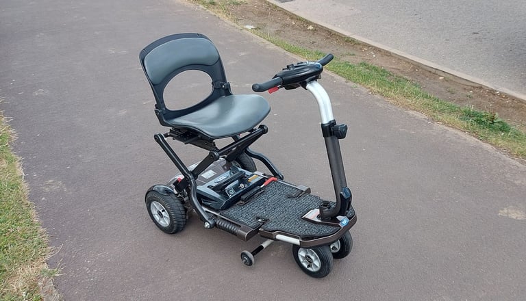 image for Minimo ultra lightweight folding mobility scooter *I can deliver*