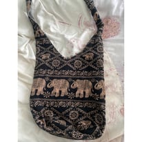 Medium sized shoulder bag with elephants 