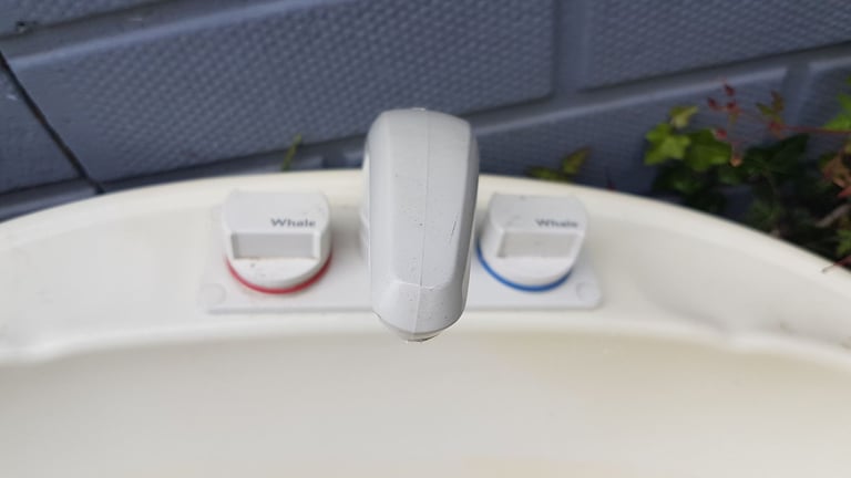 Bathroom sink with mixer tap.