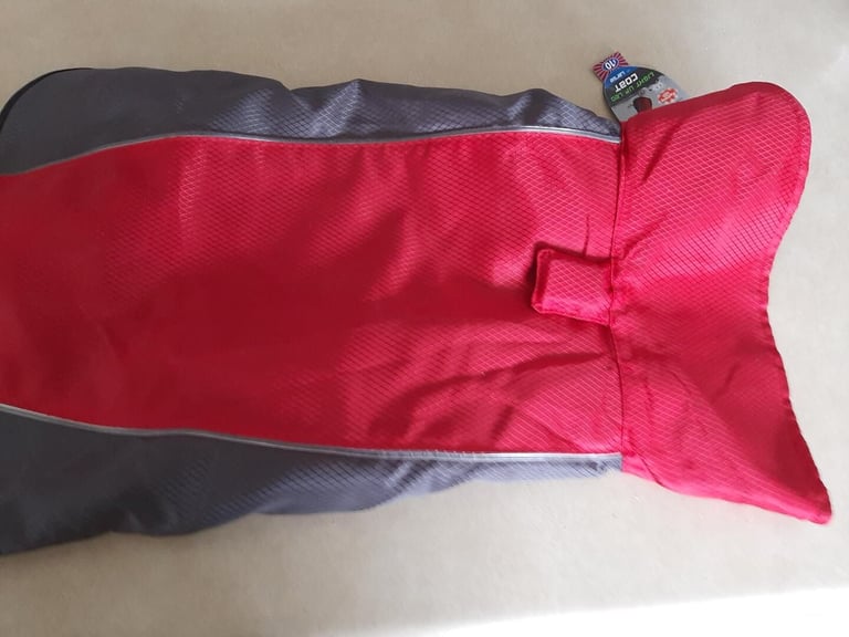 Dog coat water resistant. with removable fleece lining. coat lights up. new  size large.