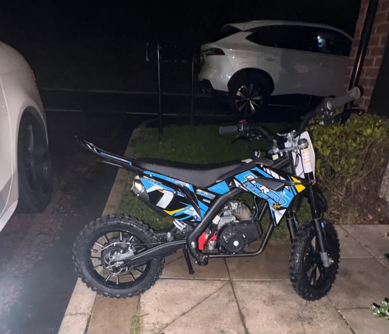 KIDS MXR 50cc.  (Rev and go.)