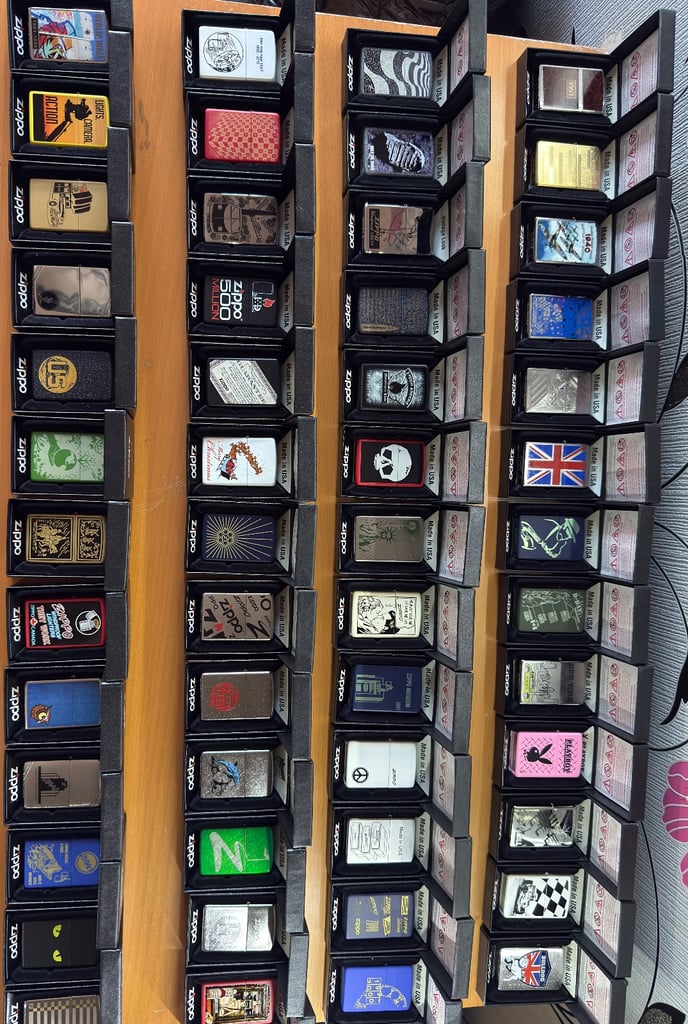 Zippo premium collection 104 lighters, display cases plus extras brand new unused 
