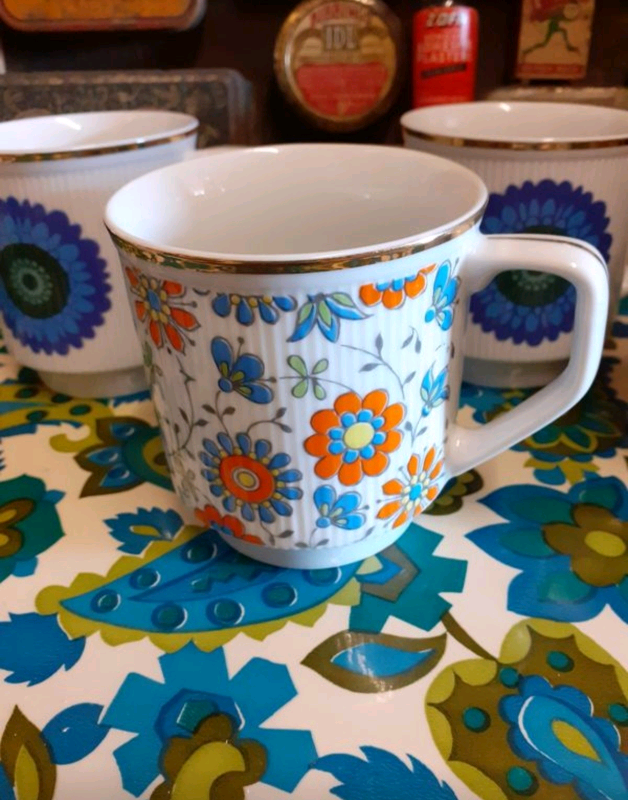 Unused retro mugs. Has gold coloured edging. Made in Poland. 