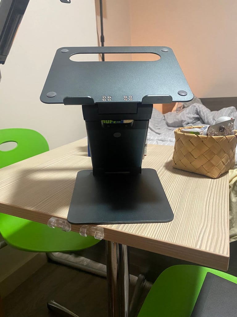 image for Adjustable metal laptop stand – sturdy, tilting, great condition