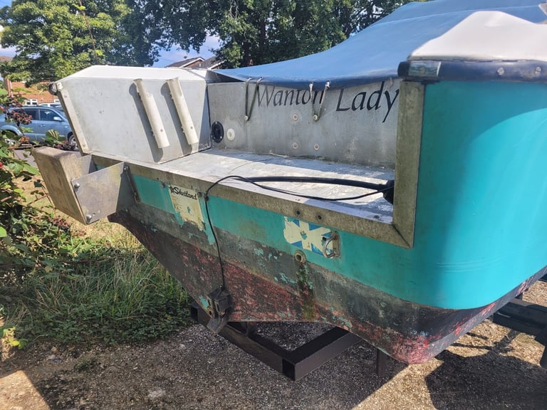 Shetland 460 cabin boat and road trailer.