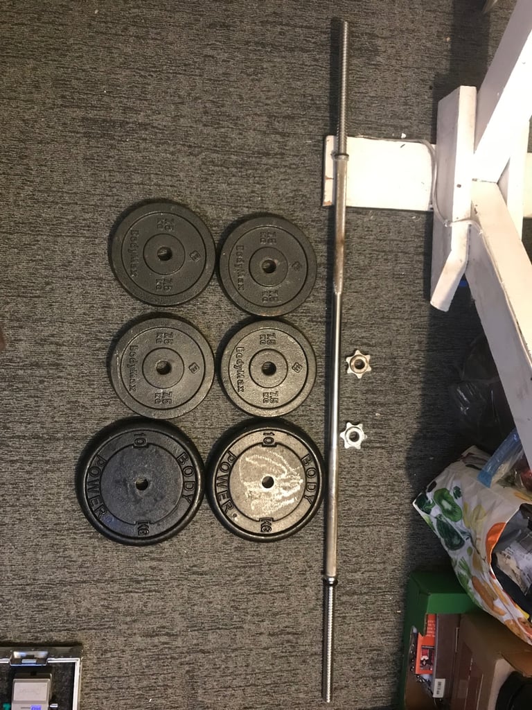 Weight plates (50kg total) and bar