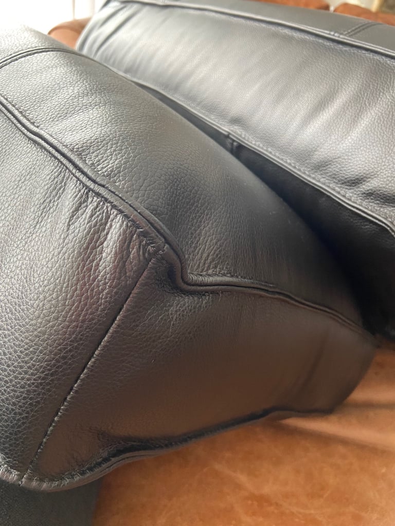 2 firm decorative leather pillows.