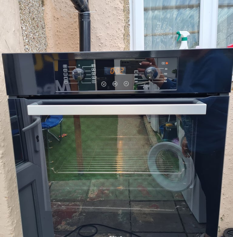 image for Miele single electric oven built-in black multifunction 