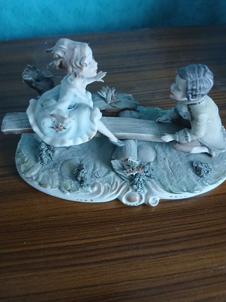 image for PORCELAIN ORNAMENT 2 CHILDREN ON SEE SAW