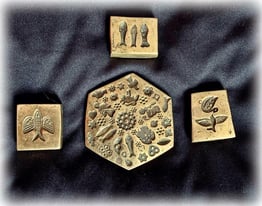 A set of vintage solid brass jewellery making moulds 