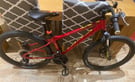 Carrera 24” Boys/Girls Bike, Red, Excellent used condition 
