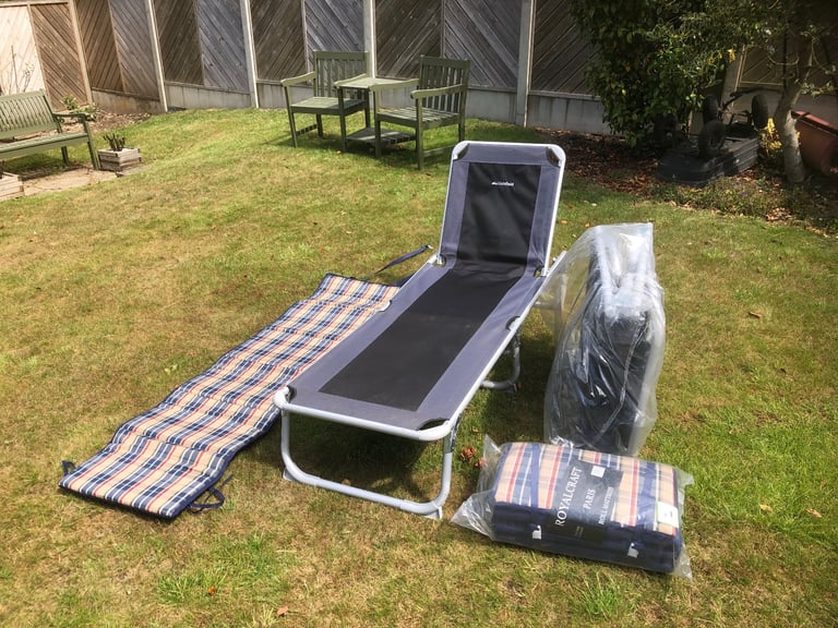 Pair of Lichfield Sun Loungers and padded covers