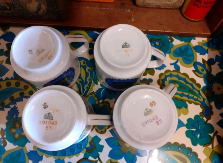 Unused retro mugs. Has gold coloured edging. Made in Poland. 