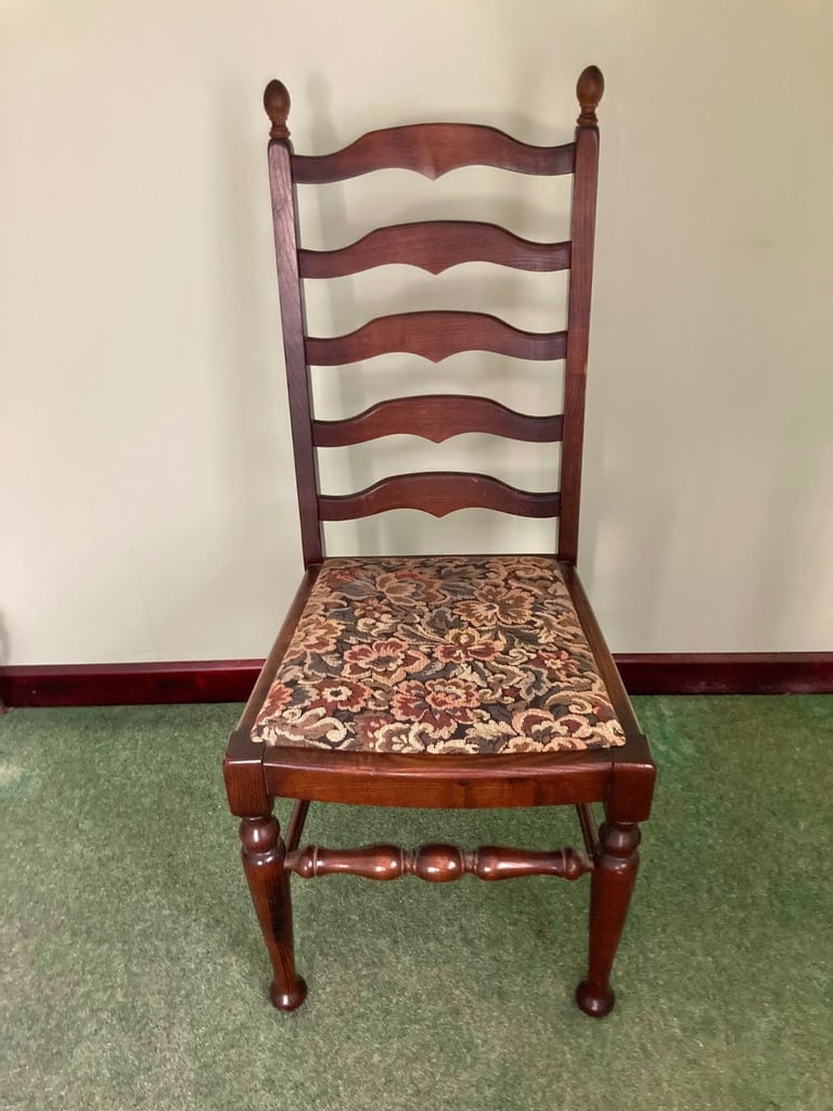 Dark mahogany finish dining table and six chairs