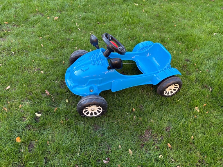 Blue pedal car