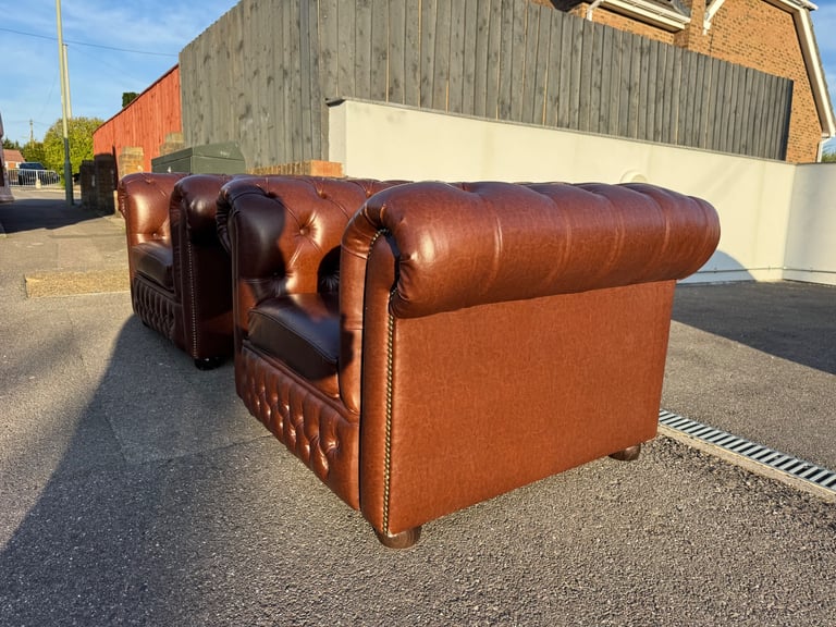 Pair of chesterfield faux brown leather club armchairs 