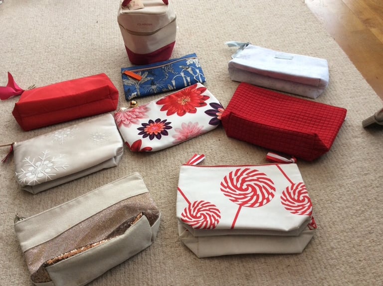 image for Variety of toiletries/make up bags all clarins