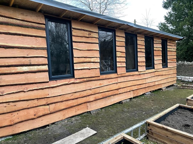 Scottish larch cladding square edge and waney edge 