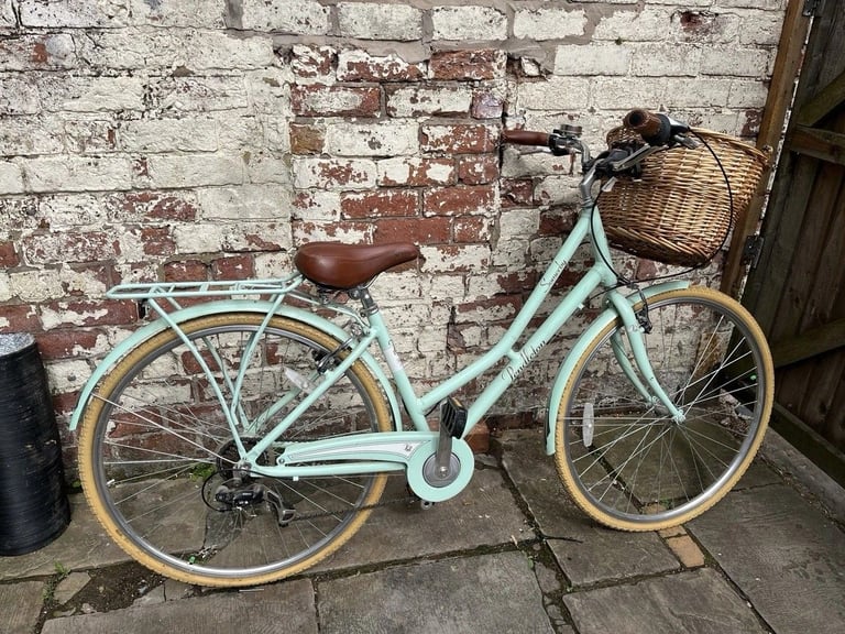 Victoria Pendleton dutch style town bike with a basket 