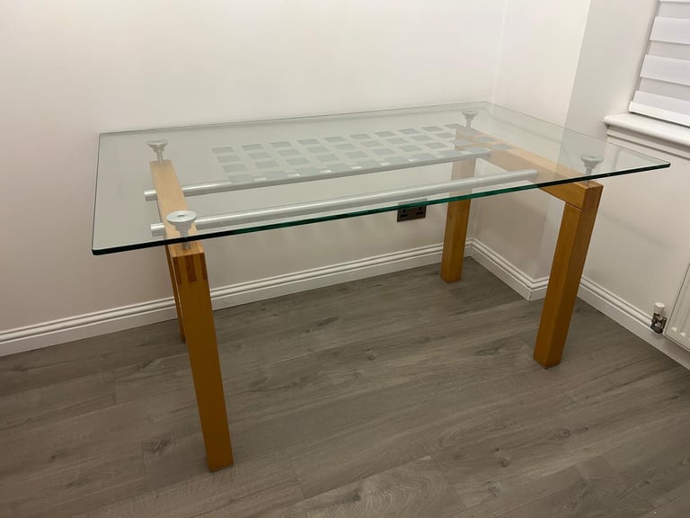 Glass dining table plus four chairs 