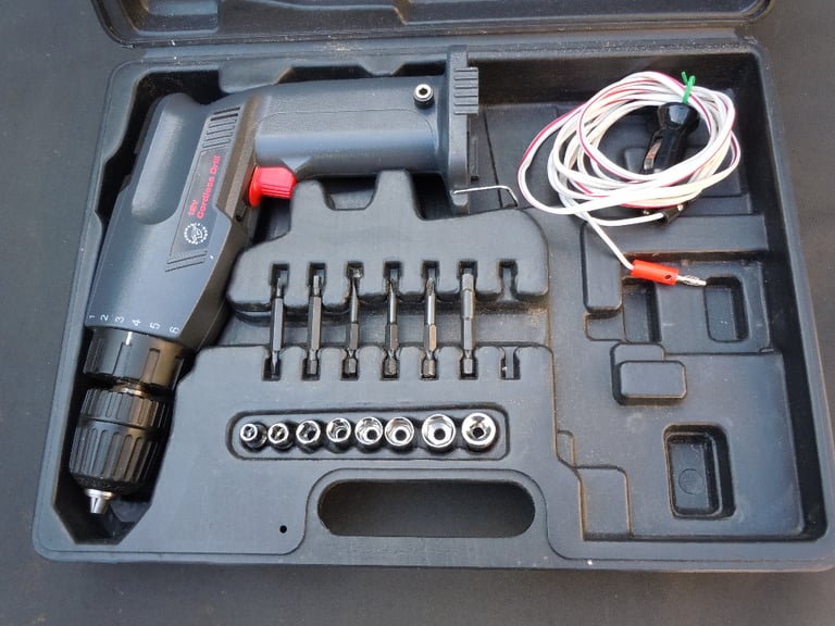 !2 Volt Drill/Driver adapted to run directly from an automobile lighter socket.