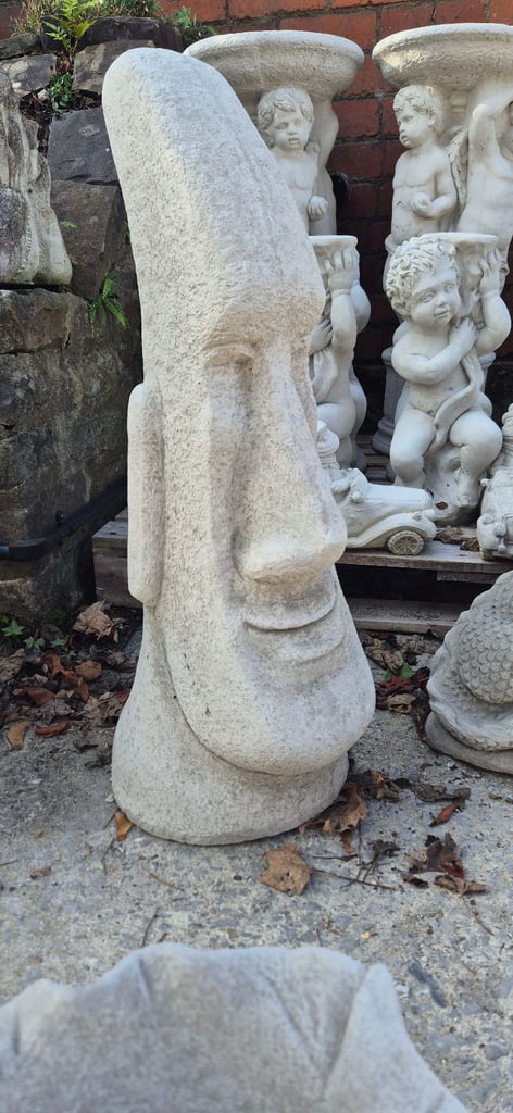 Large concrete Easter island head statues
