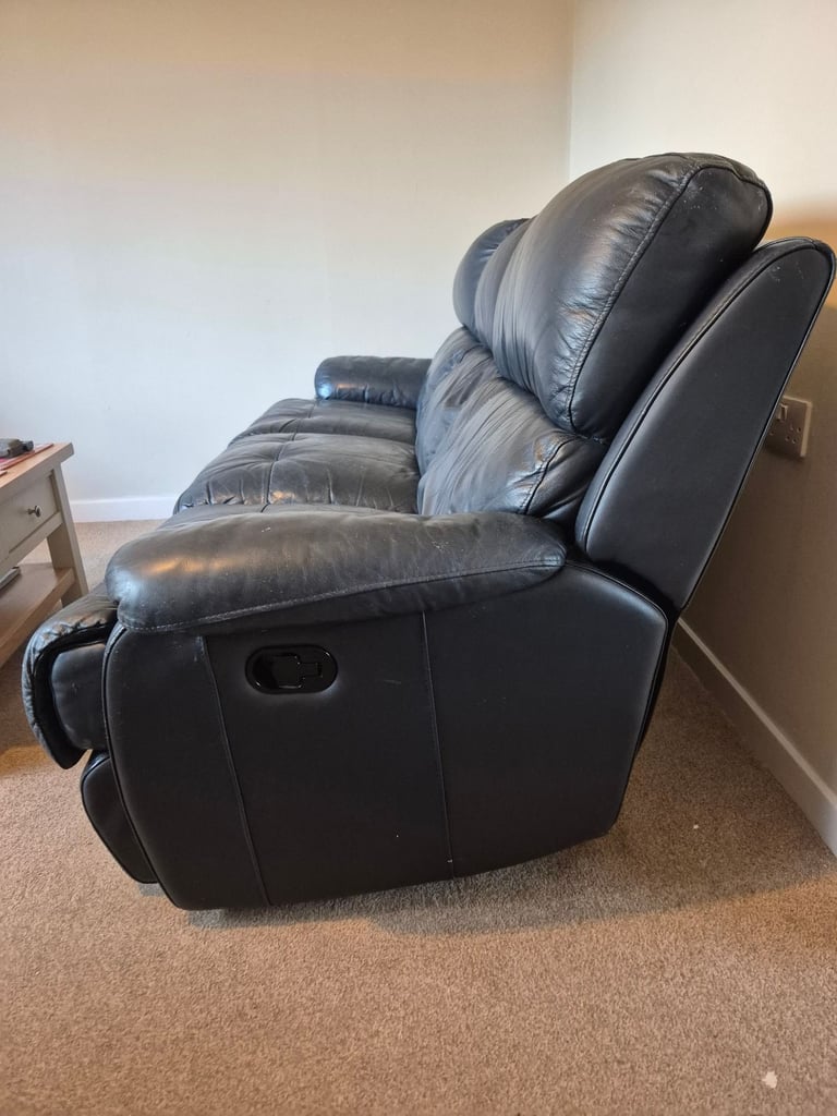 FREE TO UPLIFT..LEATHER RECLINER COUCH