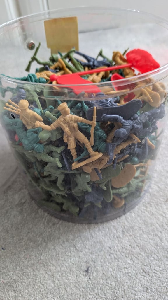 Box of plastic soldiers and flags