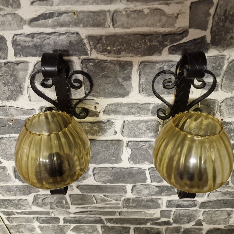 Pair of Vintage Wrought Iron Wall Sconces with Amber Glass Shades