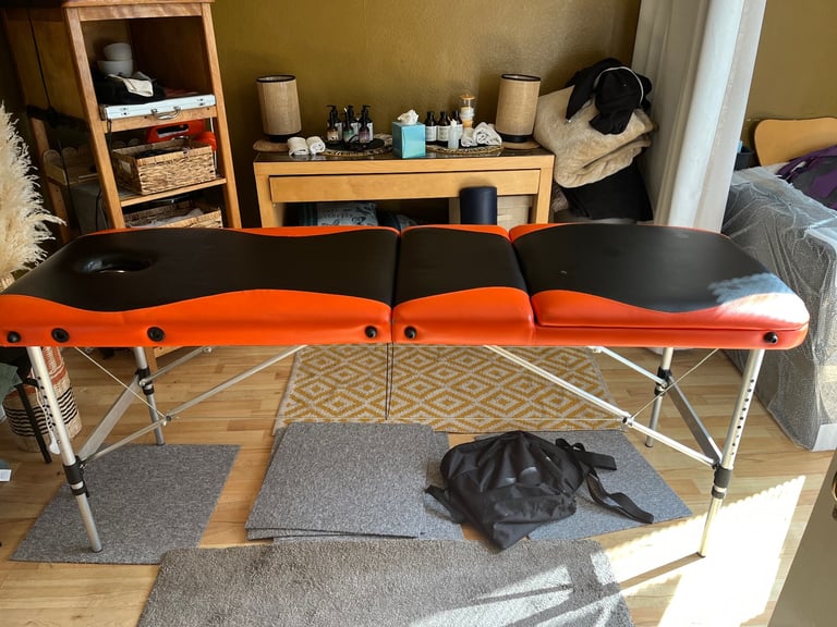 Massage table