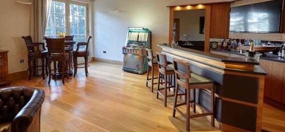 image for Luxury Walnut Home Bar with Stone Tops, Leather Stools & Lighting