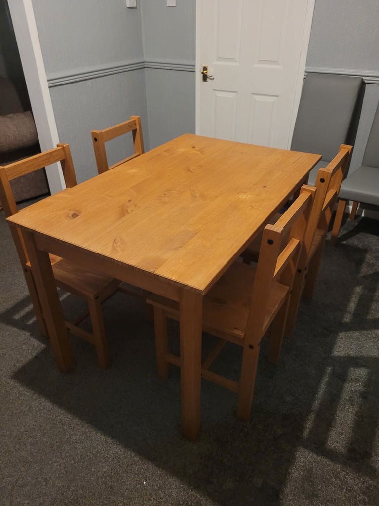 image for Dining table and chairs