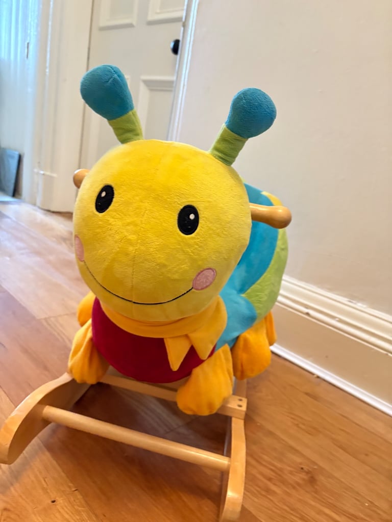 Rocking caterpillar rocking horse type toy 