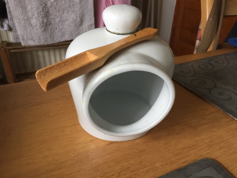 TWO SALT PIGS ONE LARGE AND ONE WITH A WOODEN SPOON £3 EACH