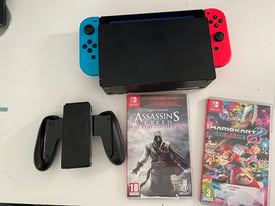 Nintendo Switch 32GB with Mario Kart 8 Deluxe and Assassins Creed