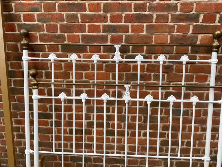 White wrought iron bedstead