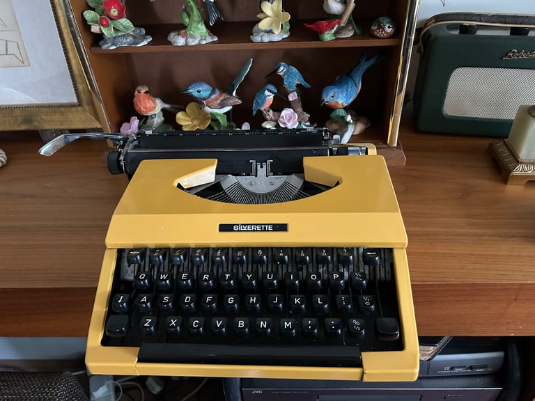 Vintage Yellow silverette typewriter 