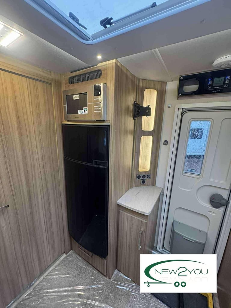 2016 Lunar Delta RI 4 Berth TRASNVERSE BED Caravan - STOCK NO E193