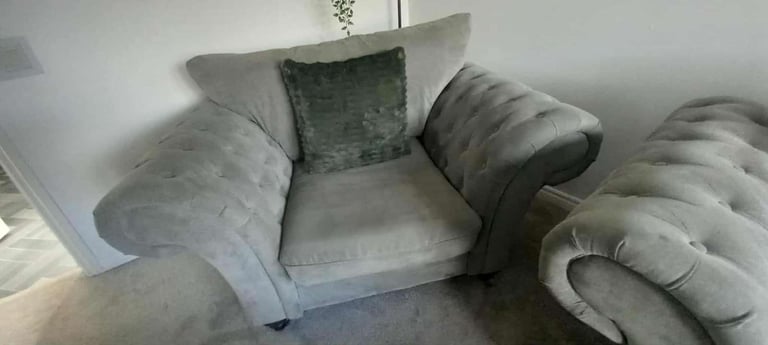 Corner suite with armchair and pouffe