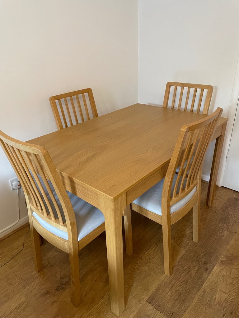 image for Ikea extendable Oak Table & 4 Oak chairs with grey fabric