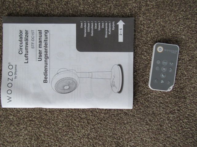 Woozoo floor standing fan, with remote.
