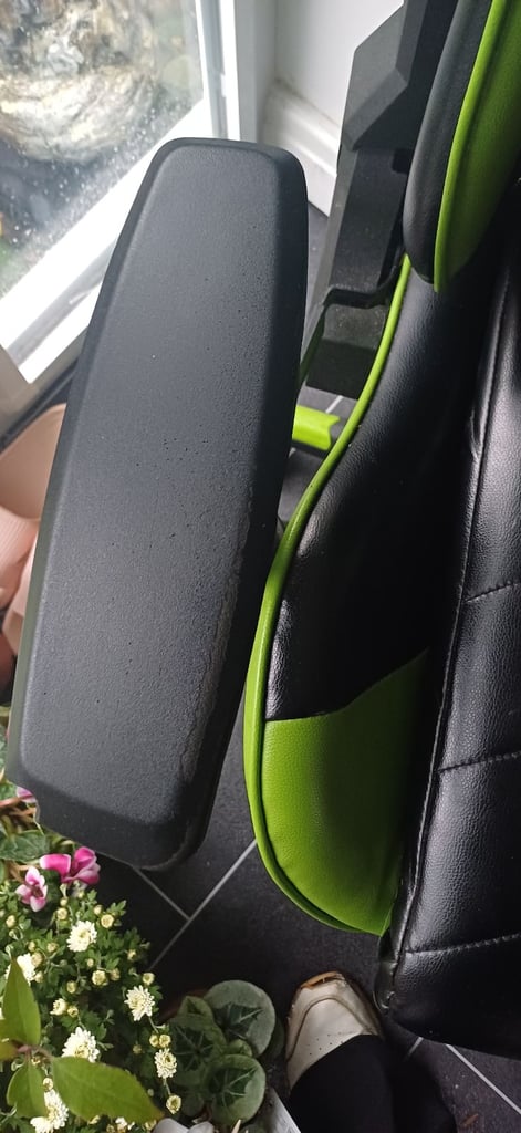 Black and green gaming chair.