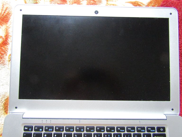 silver JOOMPER 14inch laptop tools in good condition lightly used 64GB own charger