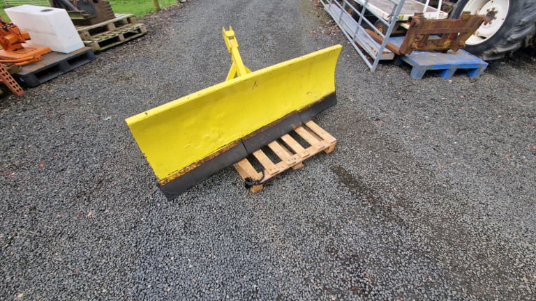 Tractor three point linkage angled snow spring loaded 