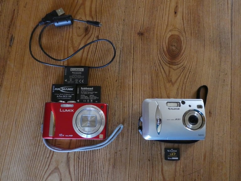 Two digital cameras for enthusiast to use or for parts. 