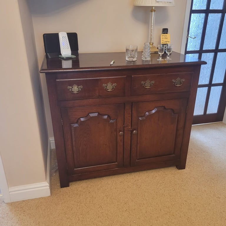 dark wood sideboard can deliver locally