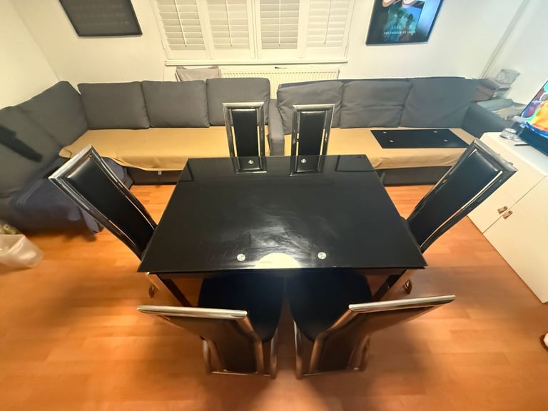 image for Black Glass Extendable Dining Table with 6 Chairs – Used Condition