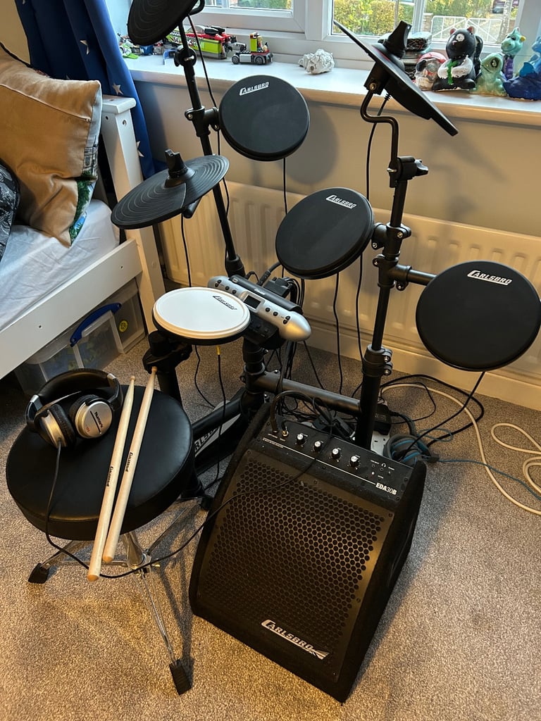 image for Carlsbro Electronic drum kit, amp, sticks, headphones and stool